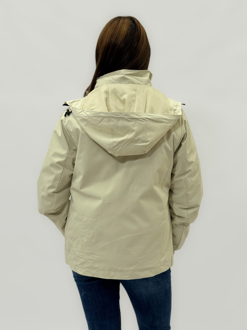 Beige Anke™ windbreaker jacket with hood by Emma & Rose Cape Town, lightweight waterproof outerwear for women.