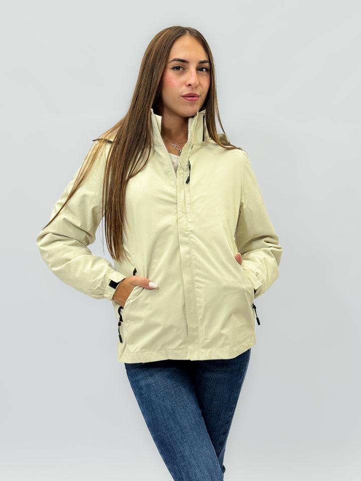 Beige Anke™ windbreaker jacket with hood by Emma & Rose Cape Town, lightweight and stylish for outdoor wear.