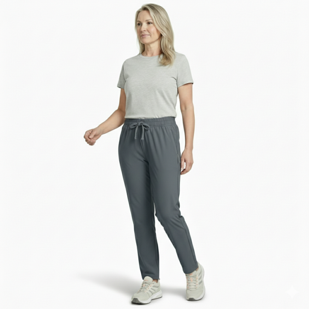 Emma & Rose Cape Town Outdoor Quickdry Stretch Pants Pro in glide pose, showing lightweight, flexible outdoor hiking pants with stretch fabric.
