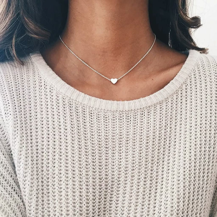 Gold Radiant Necklace by Emma & Rose Cape Town featuring intricate design and elegant pendant.