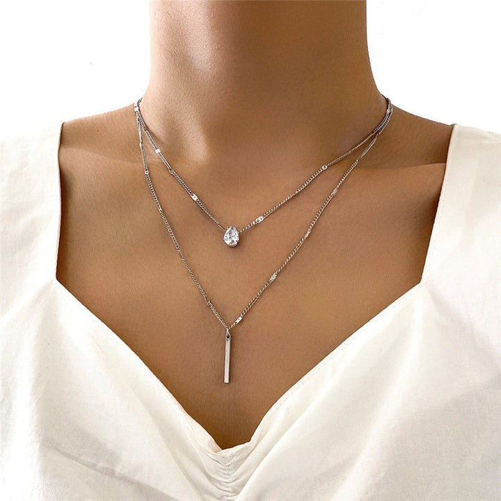Gold Jacoba™ vintage necklace set with pendant, featuring intricate design and elegant craftsmanship by Emma & Rose Cape Town.