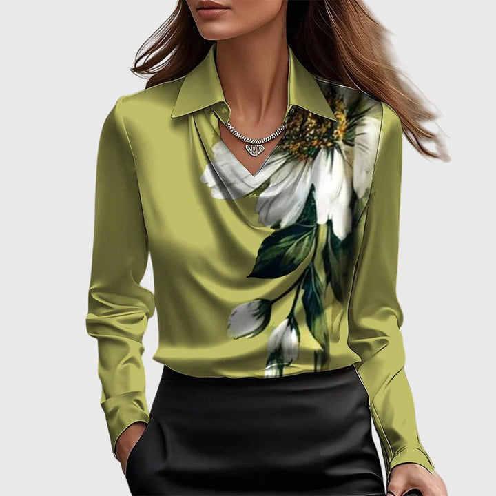 Emma & Rose Cape Town Lize™ elegant gold blouse, slim fit with long sleeves, stylish design, displayed on a hanger.