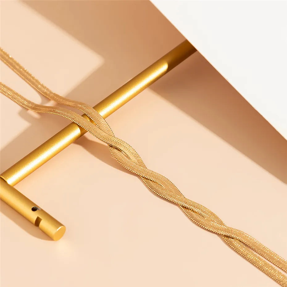 Gold Yana™ elegant long necklace by Emma & Rose Cape Town featuring intricate design and delicate chain.