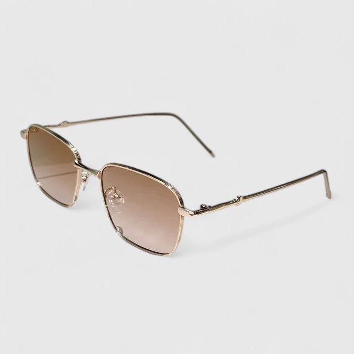 Emma & Rose Cape Town Raygynn™ stylish sunglasses with golden and black frames, featuring a modern, trendy design.