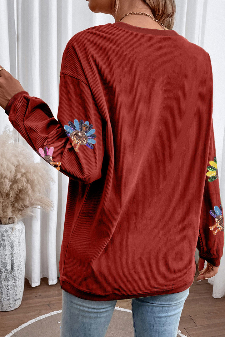 Racing red Turkey graphic sequins patch corded baggy sweatshirt by Emma & Rose Cape Town, with bold Turkey design and comfy fit.