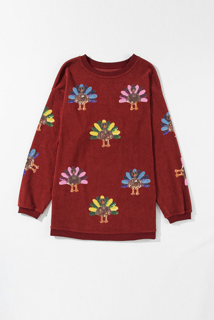 Racing Red Turkey graphic sequins patch corded baggy sweatshirt by Emma & Rose Cape Town, featuring a bold turkey design and casual fit.