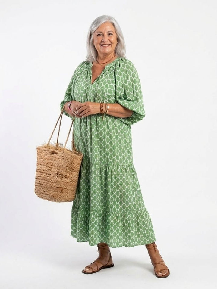 Green Apolline™ neck-patterned midi dress by Emma & Rose Cape Town, featuring a stylish fit and elegant design.