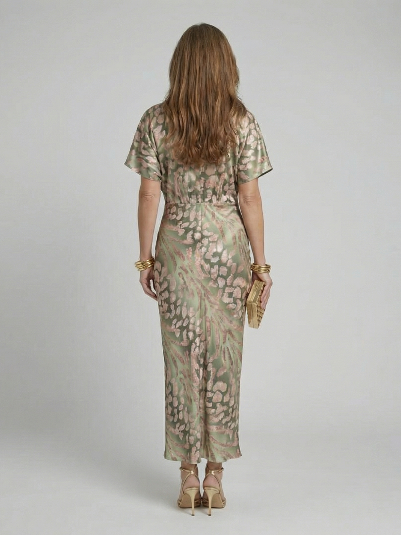Emma & Rose Cape Town Coralie™ Twist Waist Midi Dress in green, featuring a stylish silhouette and elegant design.