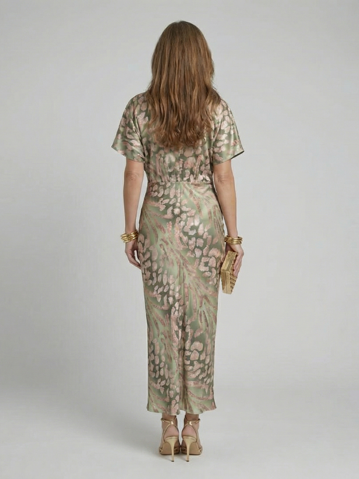Emma & Rose Cape Town Coralie™ Twist Waist Midi Dress in green, featuring a stylish silhouette and elegant design.