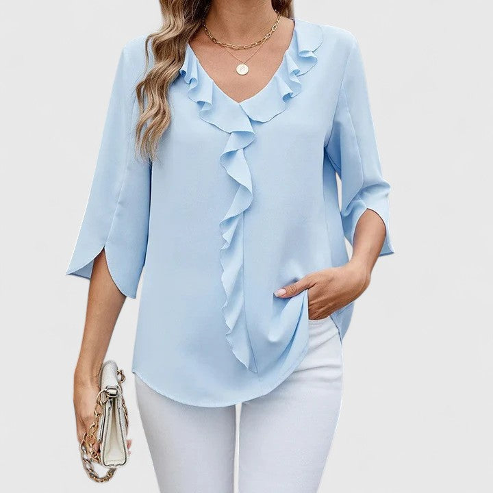 Green Debby™ elegant blouse by Emma & Rose Cape Town, featuring stylish fabric and tailored fit, displayed on a mannequin.
