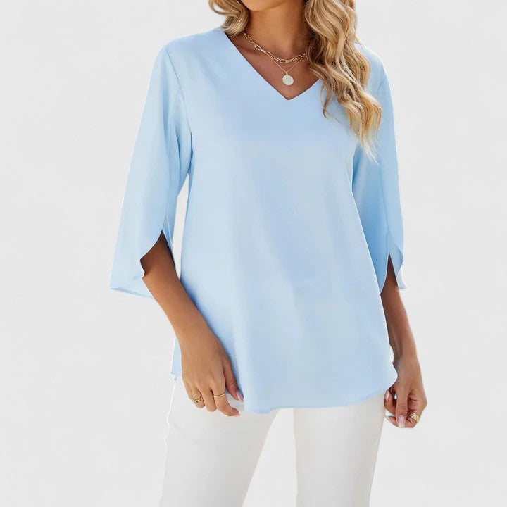 Green Debby™ elegant blouse by Emma & Rose Cape Town, featuring a stylish design and lightweight fabric.