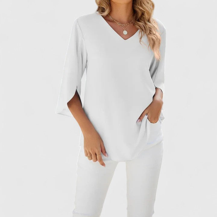 Green Debby™ elegant blouse by Emma & Rose Cape Town, featuring a stylish design and lightweight fabric.