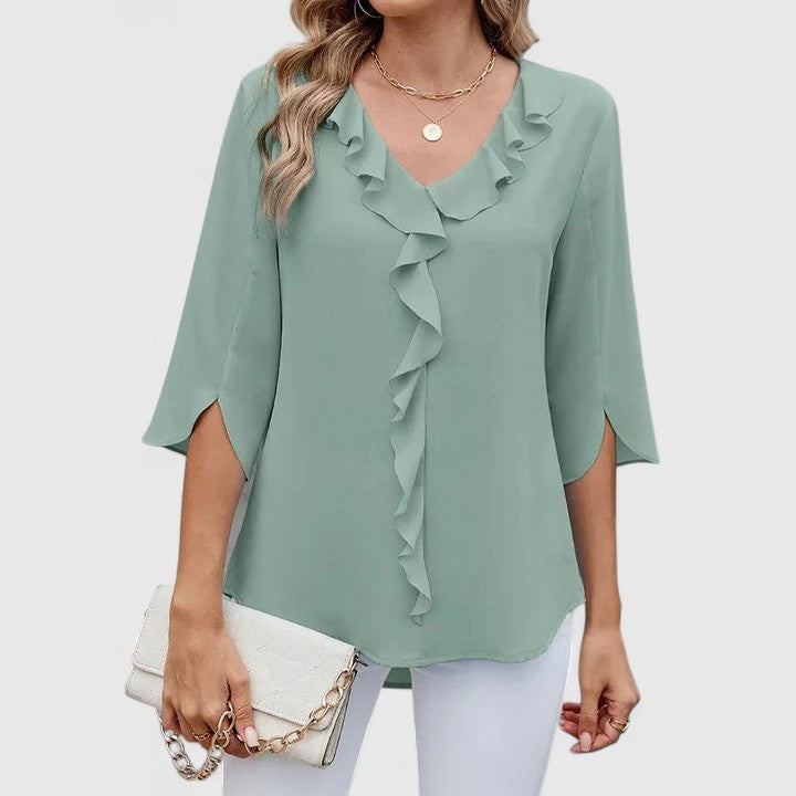 Green Debby™ elegant blouse by Emma & Rose Cape Town, featuring stylish fabric and classic design for sophisticated look.