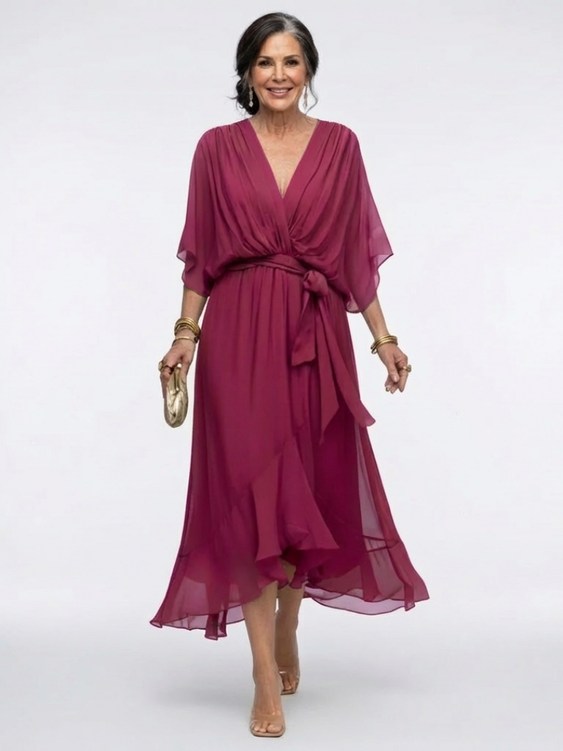 Green Elysia™ waist tie midi dress by Emma & Rose Cape Town, featuring a fitted bodice and flowing skirt.