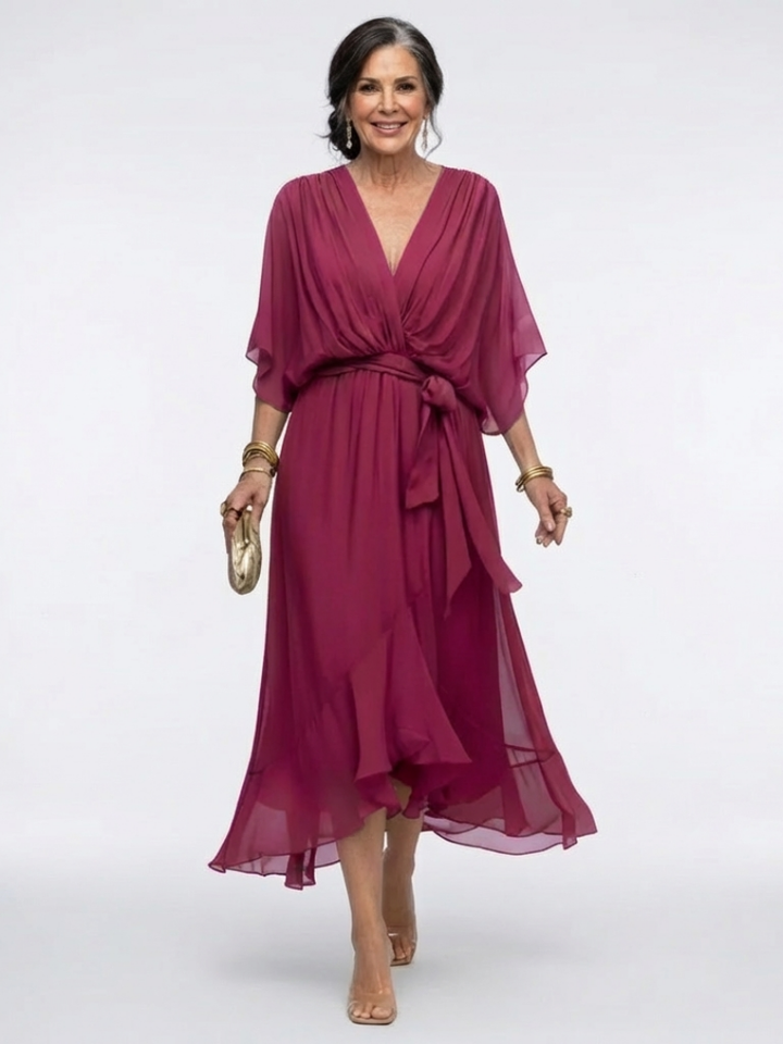 Green Elysia™ waist tie midi dress by Emma & Rose Cape Town, featuring a fitted bodice and flowing skirt.