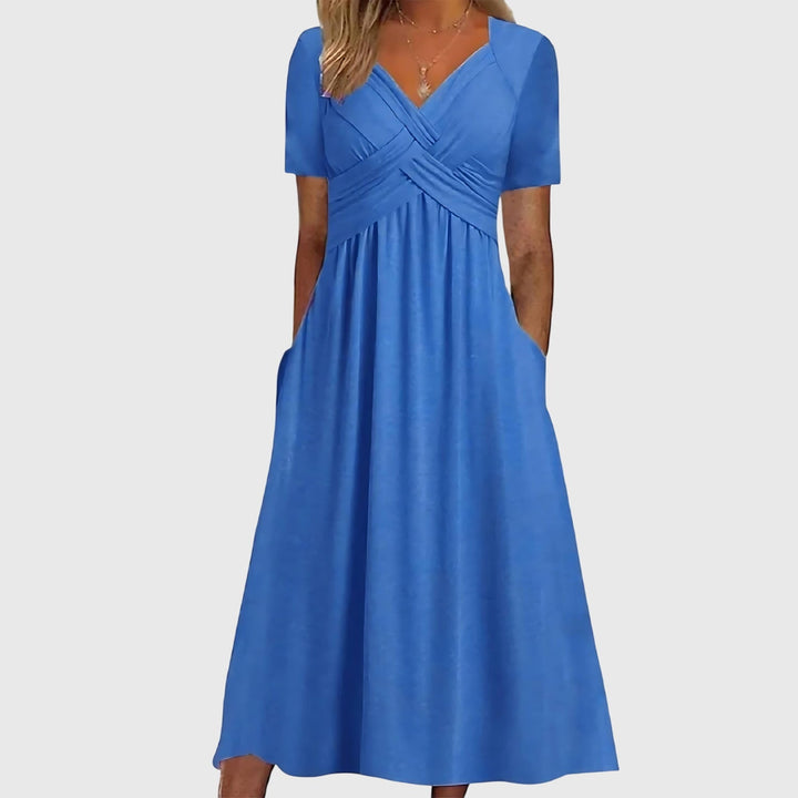 Green Viola midi dress by Emma & Rose Cape Town featuring tummy control and elegant design.
