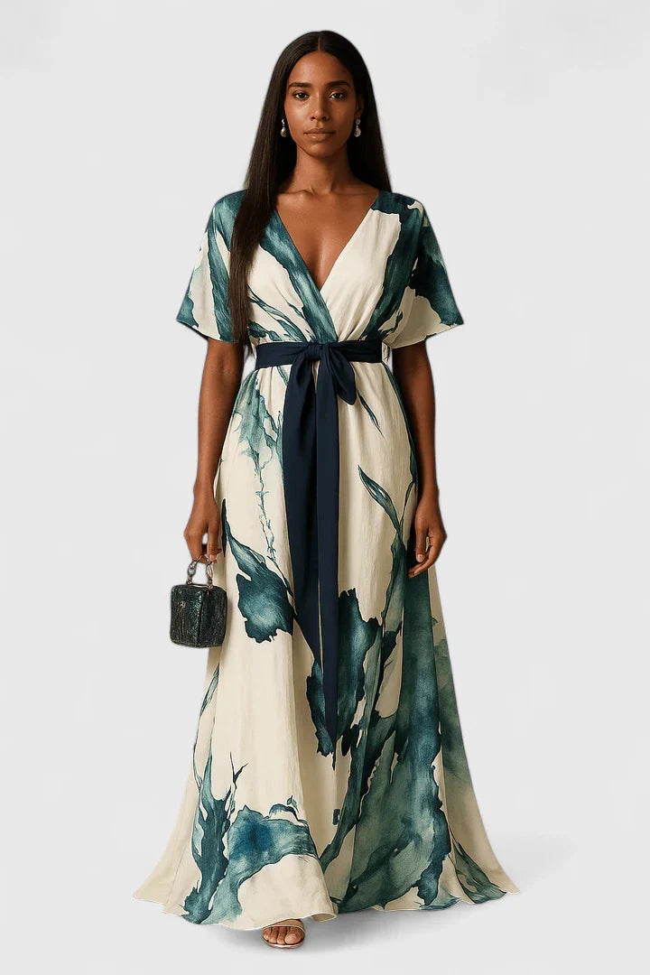 Emma & Rose Cape Town Xavrynah™ sophisticated green dress, stylish and elegant, shown on a model with intricate detailing.