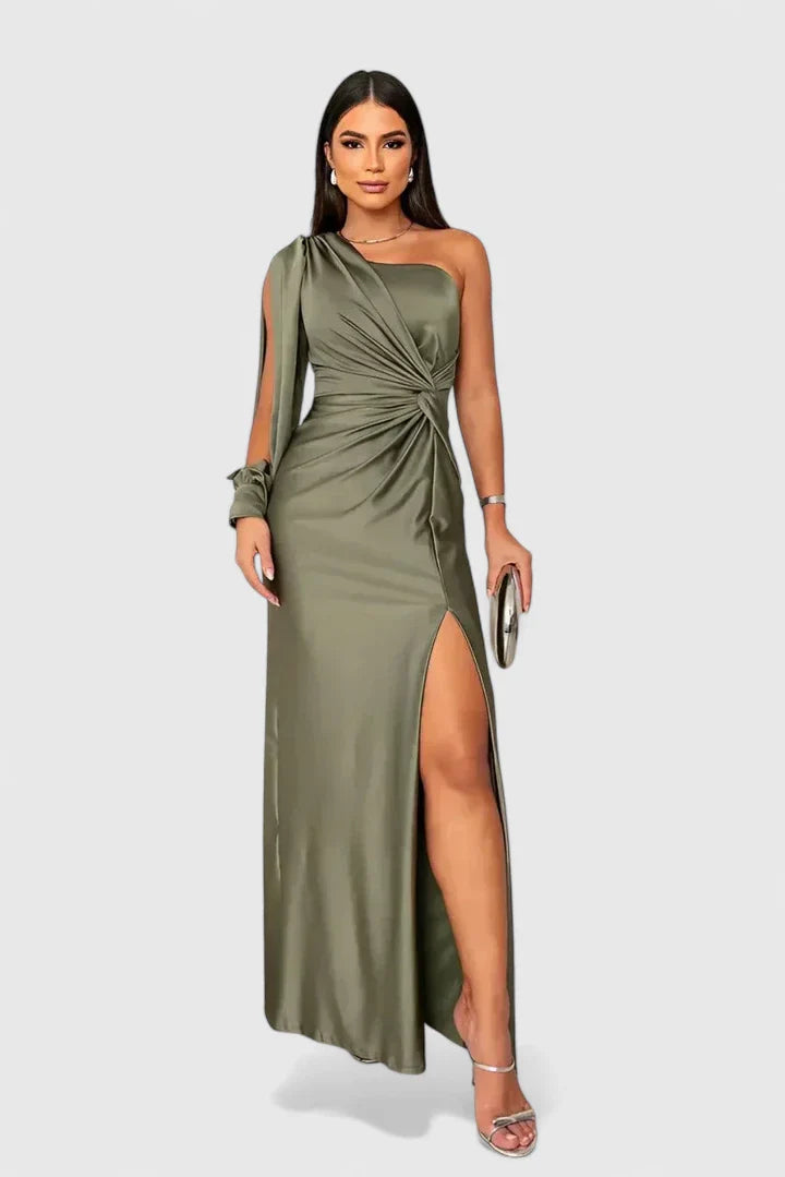 Green Saryxiah™ elegant maxi dress by Emma & Rose Cape Town, featuring flowing fabric and stylish design.