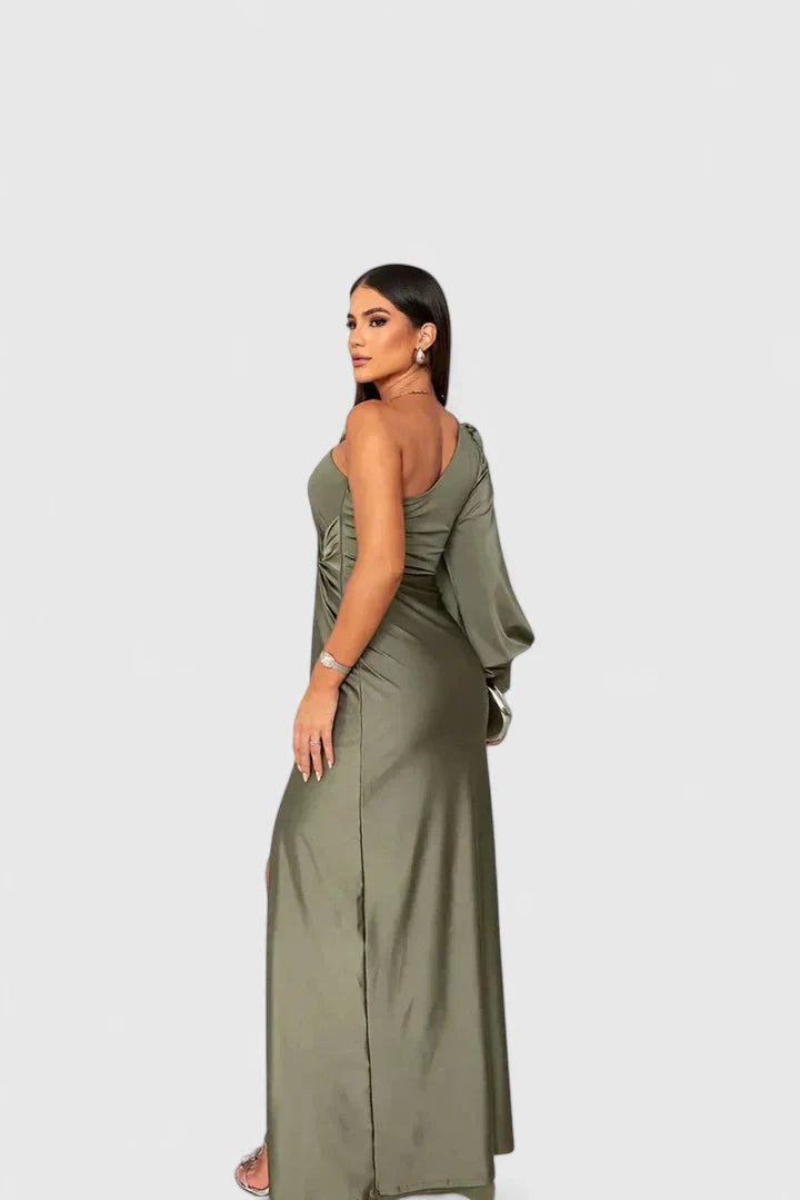 Green Saryxiah™ elegant maxi dress by Emma & Rose Cape Town, featuring flowing fabric and stylish design.