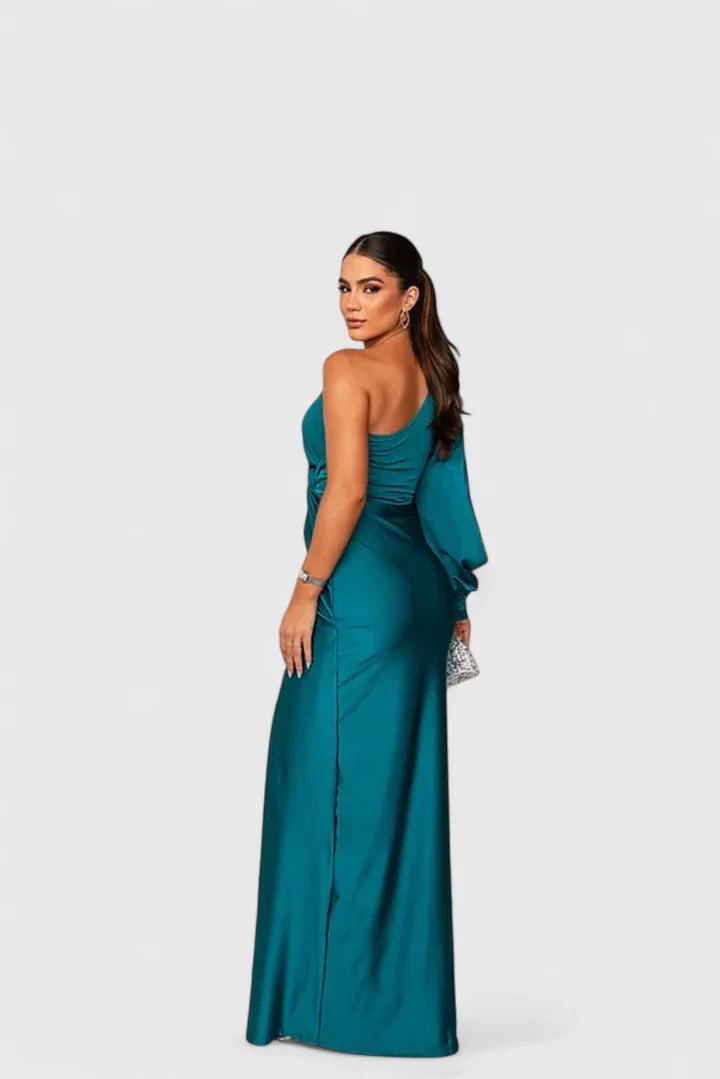 Green Saryxiah™ elegant maxi dress by Emma & Rose Cape Town, featuring flowing fabric and stylish design.
