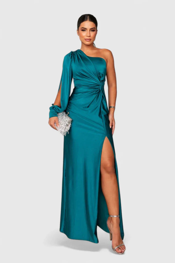 Elegant green maxi dress by Emma & Rose Cape Town featuring a flowing silhouette and intricate detailing.