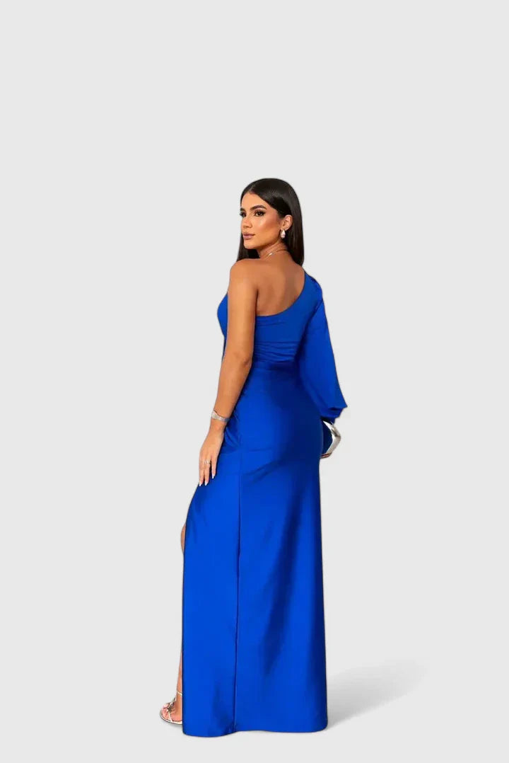 Green Saryxiah™ elegant maxi dress by Emma & Rose Cape Town, flowing fabric and stylish design, shown on a model.