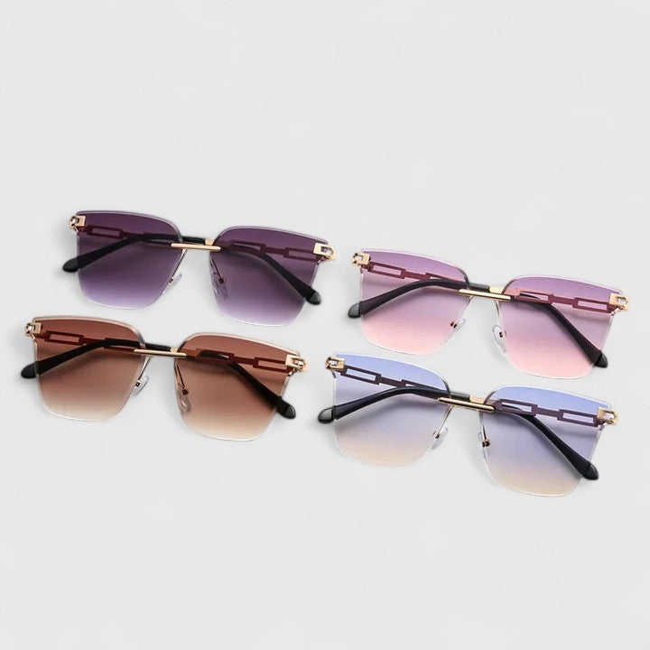 Emma & Rose Cape Town Marisyl sophisticated sunglasses with grey frames and stylish lenses, showcasing elegant eyewear design.