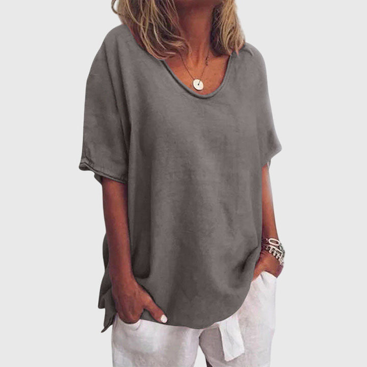 Emma & Rose Cape Town Annabelle™ elegant loose top in grey, showcasing a relaxed fit and stylish drape.