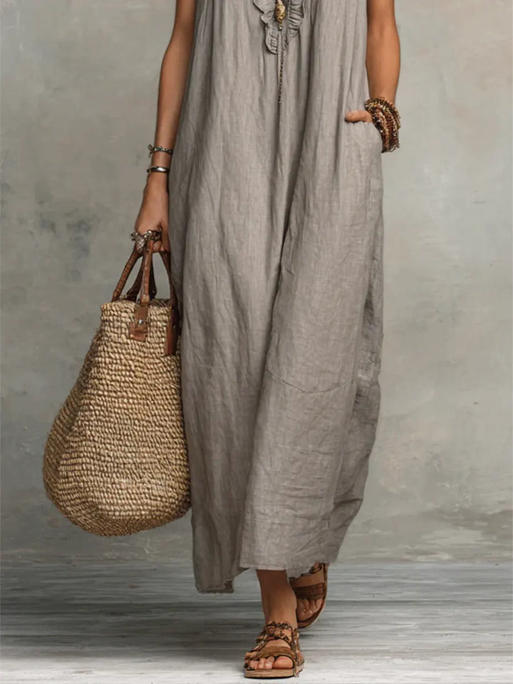 Camelia™ long bohemian dress by Emma & Rose Cape Town, featuring flowing fabric, intricate patterns, and a relaxed, stylish fit.