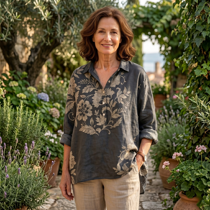 Elegant floral print blouse from Emma & Rose Cape Town, featuring Chiara™ design with lightweight fabric and stylish details.