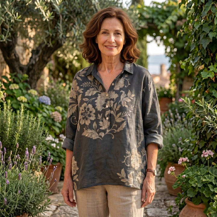 Chiara™ elegant floral print blouse by Emma & Rose Cape Town, featuring a stylish design and vibrant flower patterns.