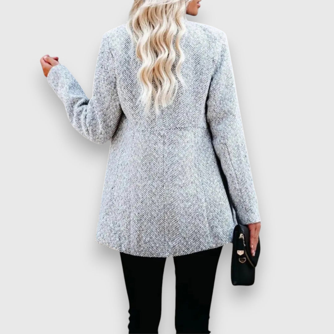 Emma & Rose Cape Town Mizari™ tailored statement blazer in grey, shown on a model with a structured fit and classic lapel.