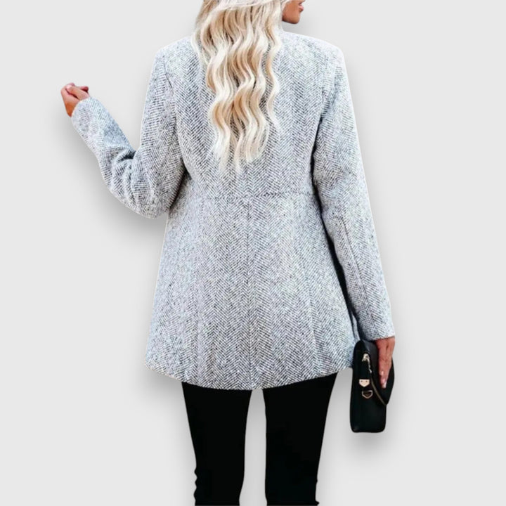 Emma & Rose Cape Town Mizari™ tailored statement blazer in grey, shown on a model with a structured fit and classic lapel.