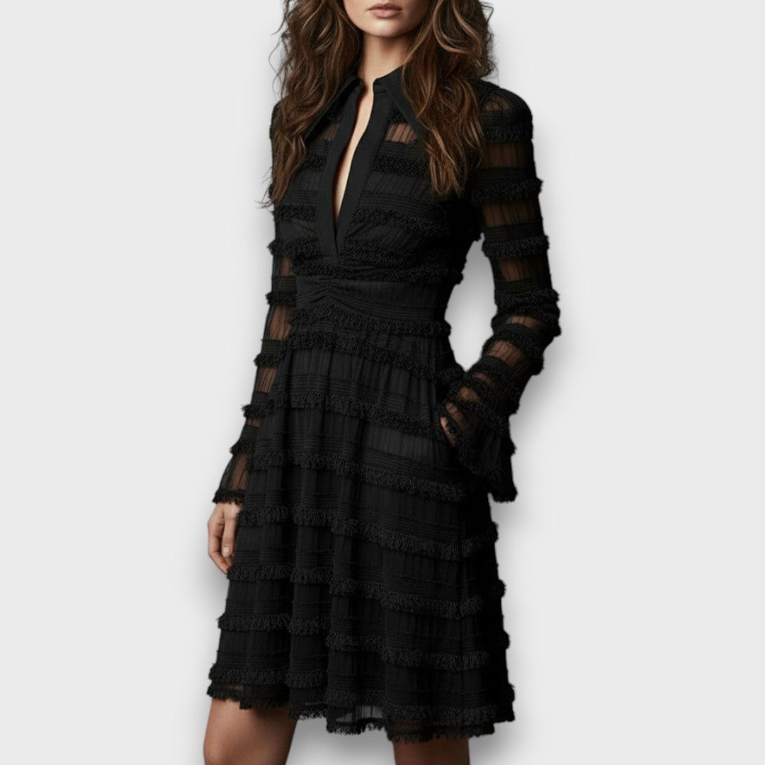 Black Nerina midi dress by Emma & Rose Cape Town featuring sheer fringes and elegant design, imported fashion for stylish occasions.