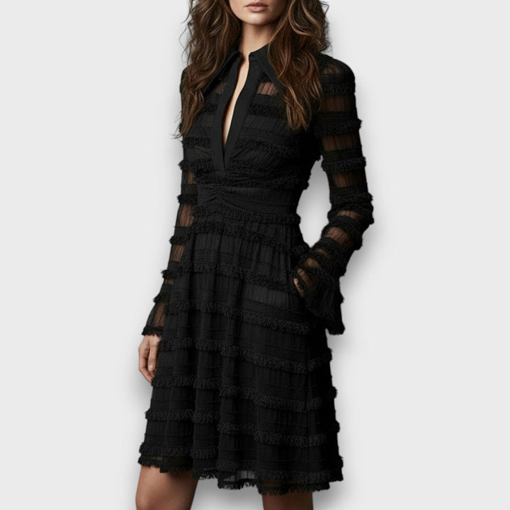 Black Nerina midi dress by Emma & Rose Cape Town featuring sheer fringes and elegant design, imported fashion for stylish occasions.