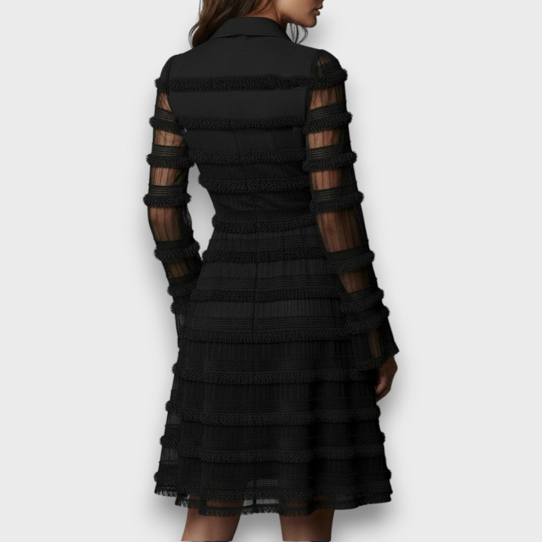 Black Nerina midi dress by Emma & Rose Cape Town featuring sheer fringes, imported stylish evening dress with elegant details