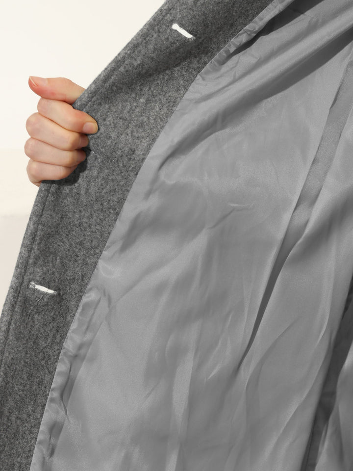 Black Elvyn™ sophisticated coat by Emma & Rose Cape Town, showing a stylish tailored jacket with a sleek design.