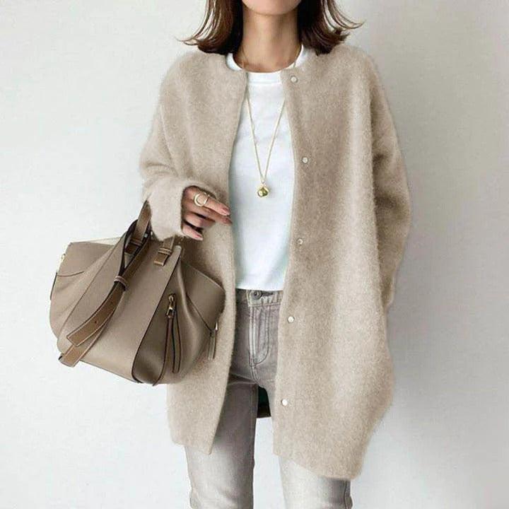 Khaki Orla™ Relaxed Fit Coat by Emma & Rose Cape Town, shown on a hanger with a tailored, casual design and soft fabric.