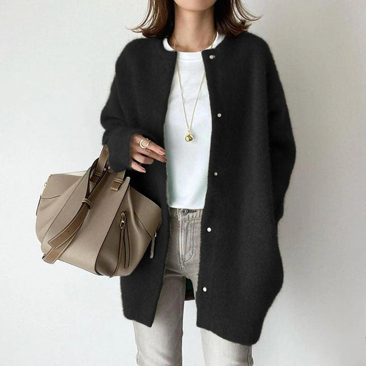 Emma & Rose Cape Town Orla relaxed fit khaki coat with modern design and comfortable silhouette, shown on a neutral background.