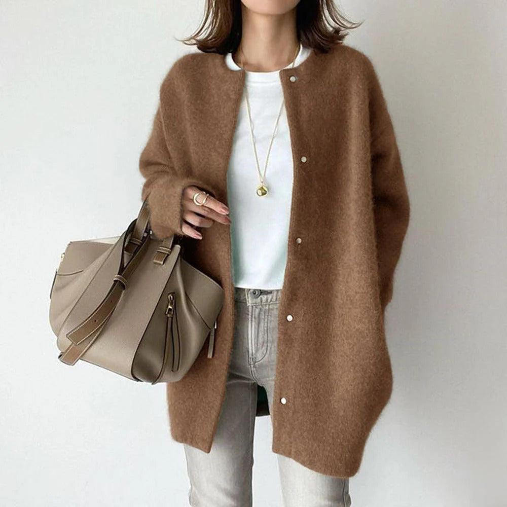 Khaki Orla™ relaxed fit coat by Emma & Rose Cape Town, showcasing the lightweight, casual design and tailored silhouette.