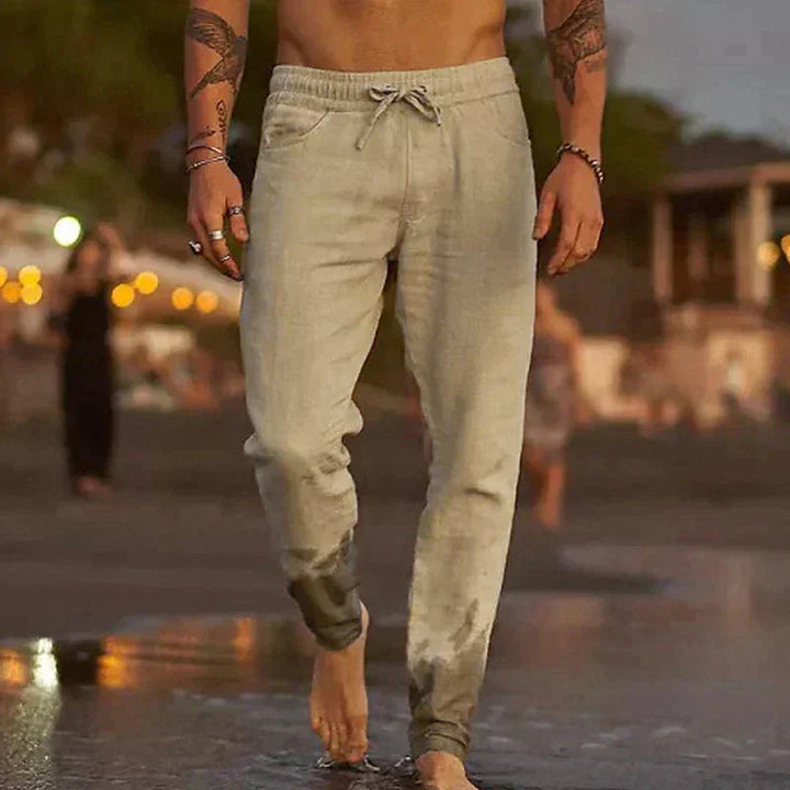 Khaki men's relaxed-fit casual pants by Emma & Rose Cape Town, suitable for summer, displayed on a model.
