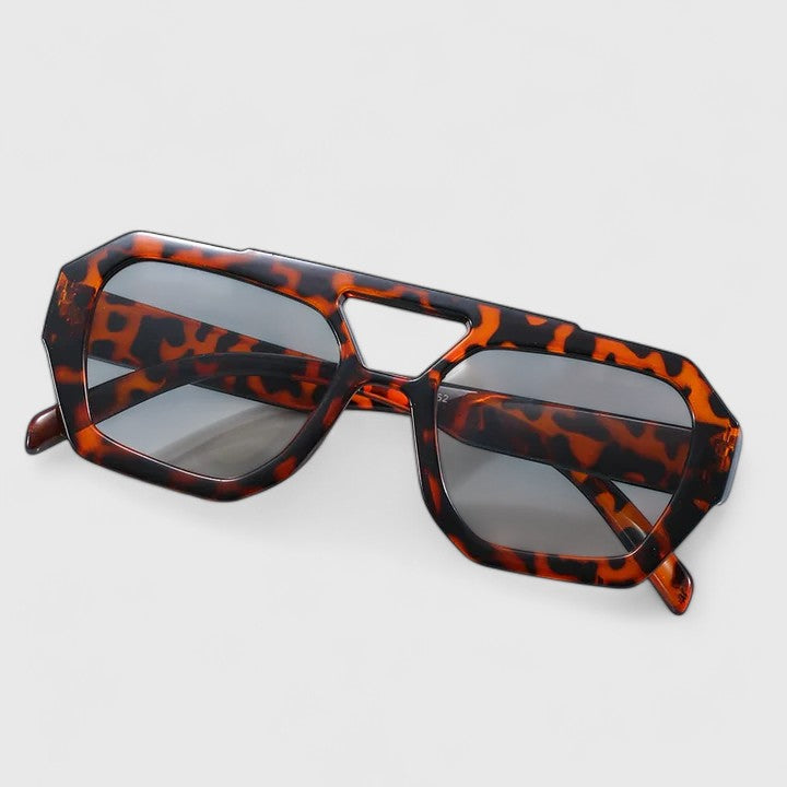 Zhaylinn™ elegant sunglasses with leopard print frames and champagne-colored lenses from Emma & Rose Cape Town.