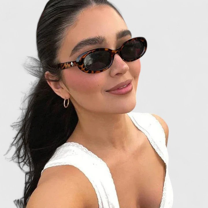 Emma & Rose Cape Town Danyqee stylish leopard-print grey sunglasses with sleek frame and tinted lenses.