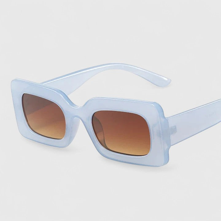 Emma & Rose Cape Town Elyanna sophisticated sunglasses with grey leopard print frames and dark tinted lenses.