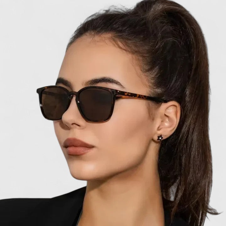 Emma & Rose Cape Town Aynzlee sophisticated sunglasses with leopard print frames and dark tinted lenses.
