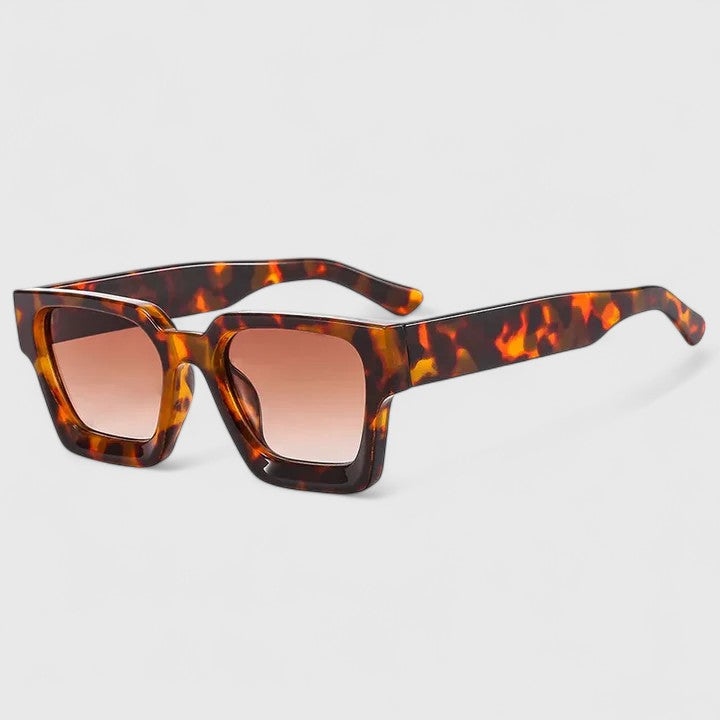 Izadora™ elegant sunglasses with leopard print frame by Emma & Rose Cape Town, stylish and sophisticated eye accessories.