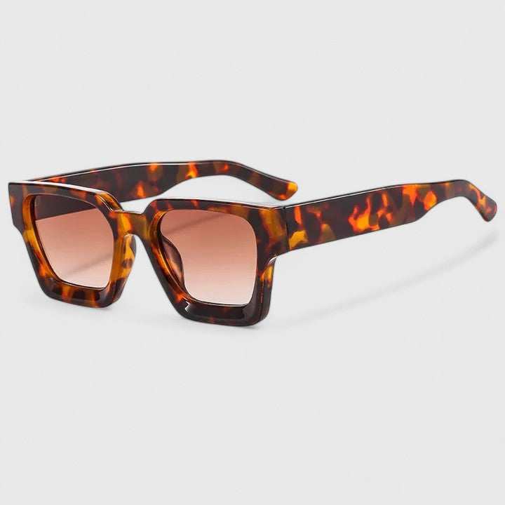 Izadora™ elegant sunglasses by Emma & Rose Cape Town with leopard print frames and tinted lenses.