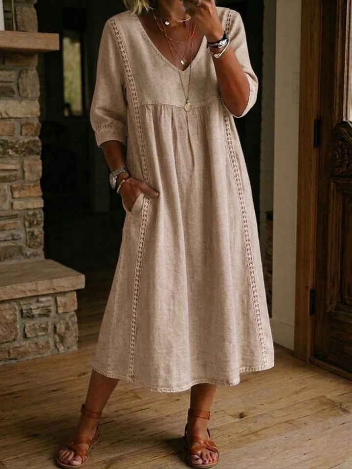 Light blue Fleur™ artistic floral sleeve dress by Emma & Rose Cape Town, showcasing elegant floral print and stylish long sleeves.