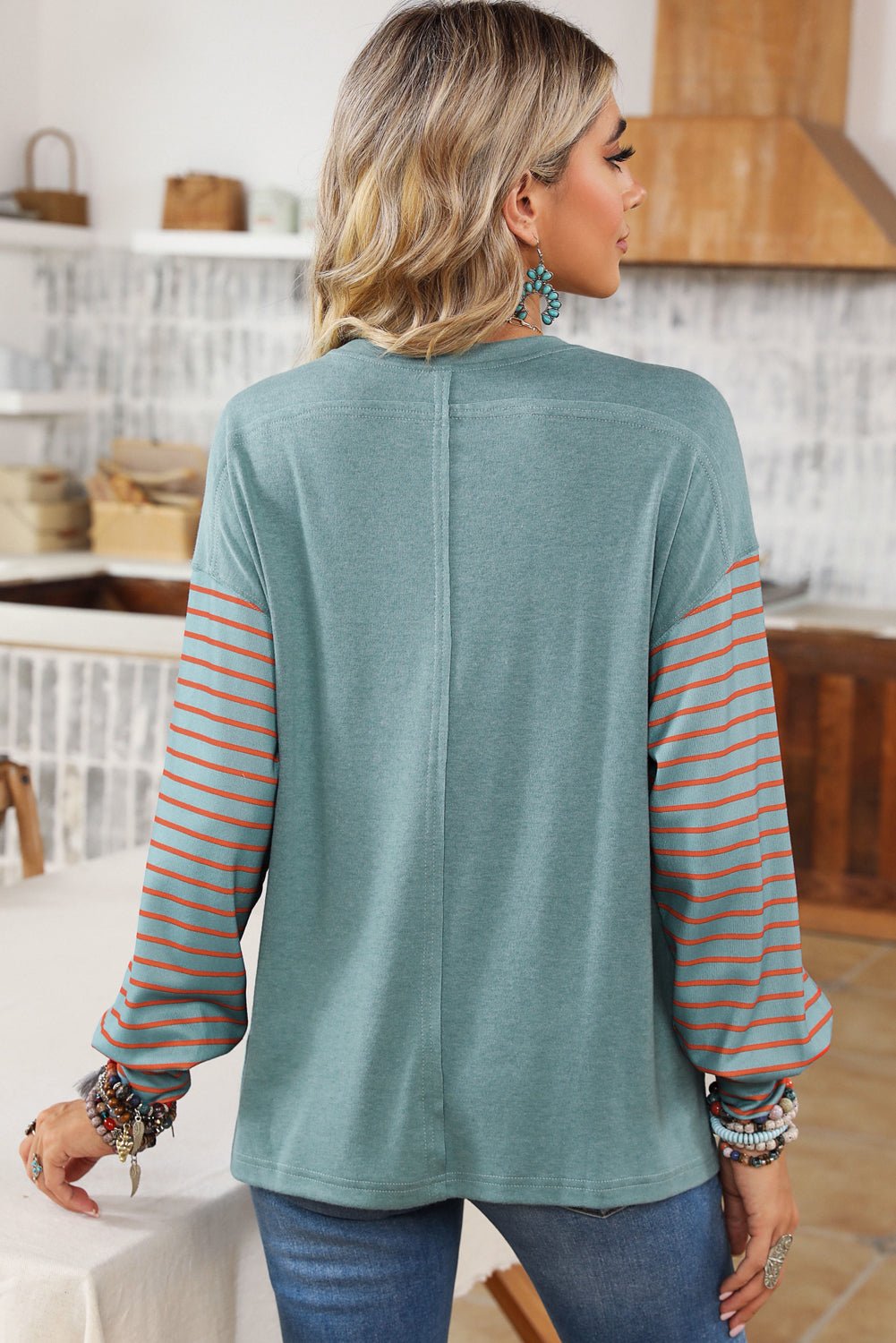 Green colorblock striped bishop sleeve top with side slits, long sleeve blouse by Emma & Rose Cape Town.