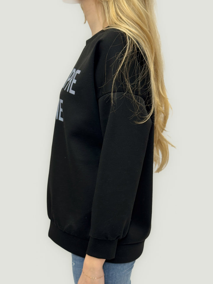 Black Lize™ light sweatshirt by Emma & Rose Cape Town, soft knit maglieria with a relaxed fit and subtle branding.